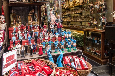 Photo for Naples, Italy, September 27, 2023: Souvenir shop shelves exposed to the street in Naples, Italy. - Royalty Free Image