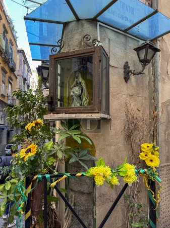Photo for Naples, Campania Italy, September 27, 2023 Chapel on the facade of a house facing the street in Naples, Italy. - Royalty Free Image