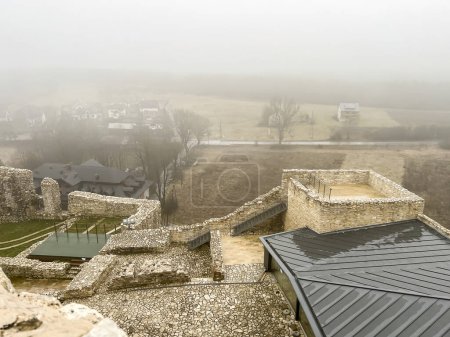 Castle ruins in Rabsztyn in Poland in foggy weather. The facility near Olkusz was partially rebuilt and made available on the Eagle's Nests trail on the Krakow-Czestochowa Upland.