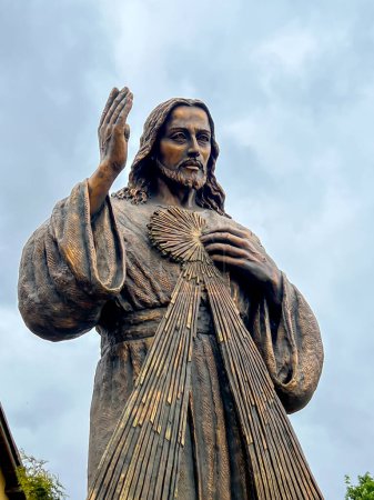 Figure of Merciful Jesus next to the church and cemetery in Gora Swietej Malgorzata (Mount of Saint Margaret) in Poland.