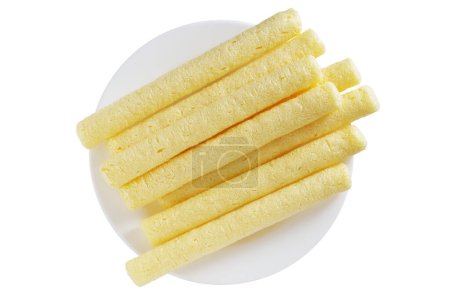Photo for Corn crispy sticks or flip snacks on a plate isolated on white background, top view - Royalty Free Image