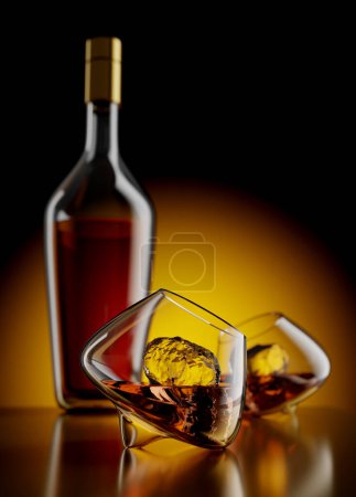 Foto de Alcohol Rum or Whiskey Bottle and Glasses on a Wooden Block - 3d Illustration Render - Imagen libre de derechos