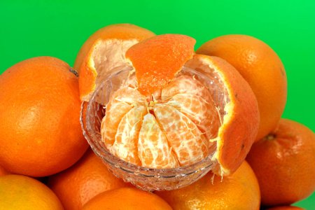 Téléchargez les photos : Clemenules mandarins are characterized by high vitamin C content, intense aroma and their bright orange color - en image libre de droit