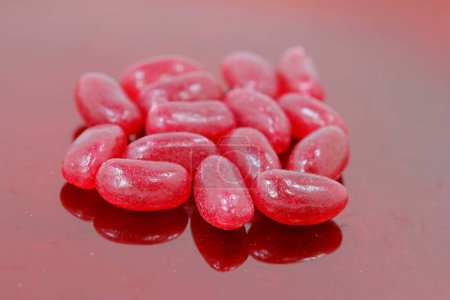 Photo for Red jelly beans, thought of crushed lice - Royalty Free Image