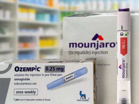 Photo for Ozempic from Novo Nordisk and Mounjaro from Eli Lilly with injection pen are medicines to help control blood sugar levels type 2 diabetes,  and weight loss. Copenhagen, Denmark - November 8, 2023. - Royalty Free Image