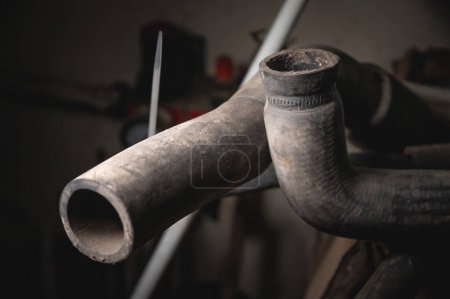 Foto de Old engine cooling hoses. Branch pipes worn in selective focus. - Imagen libre de derechos