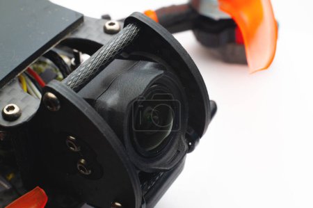 New high-tech lens heading FPV camera on a self-assembled quadrocopter. Close-up.