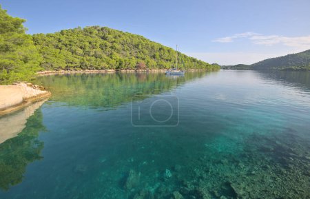 Photo for View  from Submarine and ship bunker on Lastovo island, Croatia. Concrete bunker shelter for submarines in Adriatic sea. Travel on a yacht in Croatia. - Royalty Free Image