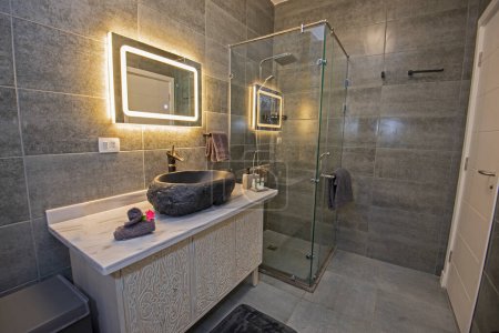 Photo for Interior design of a luxury show home bathroom with shower cubicle and sink - Royalty Free Image