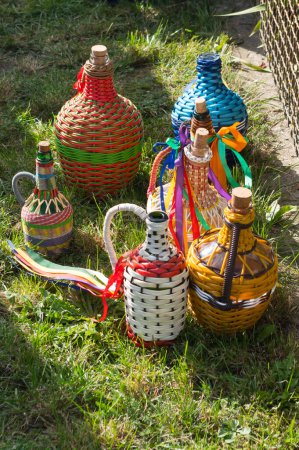Photo for Decorated demijohns. Traditional vessels for wine and other drinks that are also used at folk festivals. South Moravia, Czech Republic. - Royalty Free Image