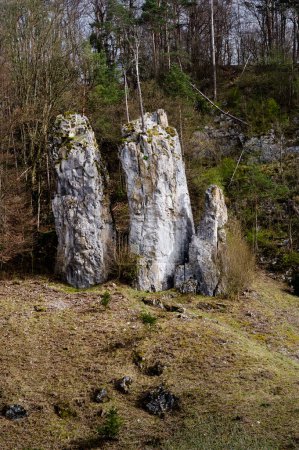 Rock formation in the Moravian Karts called Father Mother and Son. South Moravia, Czech Republic.