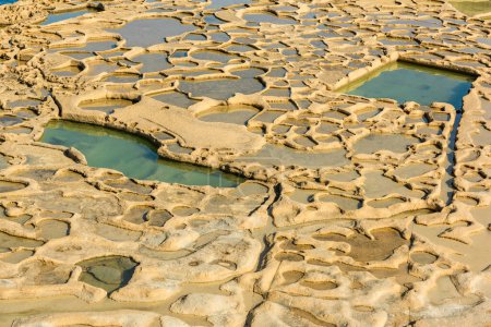 Photo for Traditional salt pans in Xwejni Bay on the island of Gozo, Malt - Royalty Free Image