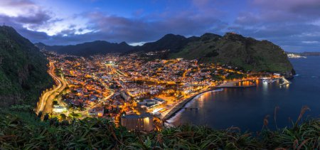 Photo for Panoramic view over Machico in Madeira island, Portugal. Night cityscape - Royalty Free Image