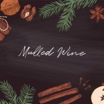 Chalk board with mulled wine ingredients, hand drawn illustration of traditional autumn spices and hot drink ingredients. Festive mood background
