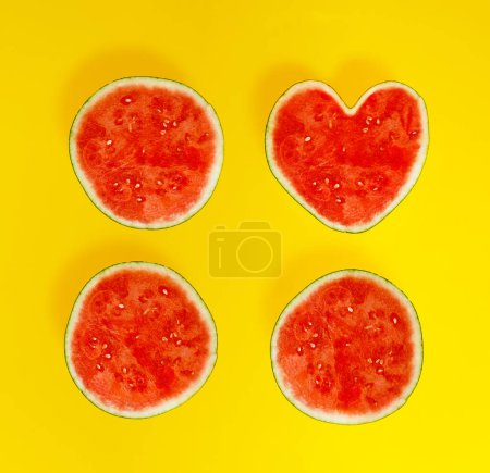 Photo for Watermelon in shape of heart among others - sweet lovely healthy food concept - Royalty Free Image