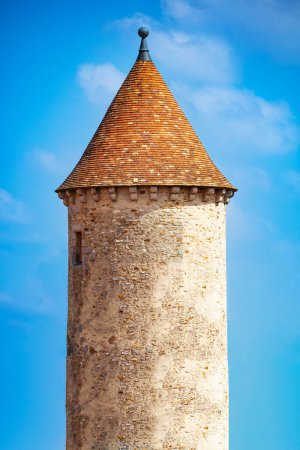 Photo for Medieval castle round tower over blue sky, Blandy-les-Tours, France - Royalty Free Image