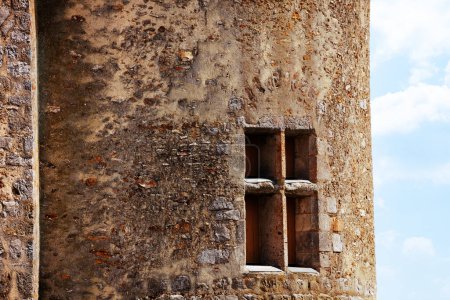 Photo for Close-up of a window in old medieval stronghold castle tower of Blandy-les-Tours, France - Royalty Free Image