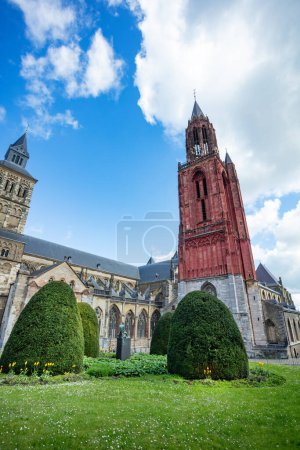 Magnificent Saint Jean church and its Red tower rising above Maastricht streets, Holland