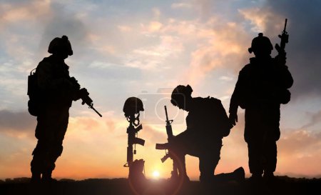 Téléchargez les photos : Illustration 3D d'un militaire agenouillé devant la tombe d'un soldat tombé au crépuscule - en image libre de droit
