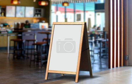 Foto de Whiteboard signage stand in front of restaurant - Imagen libre de derechos