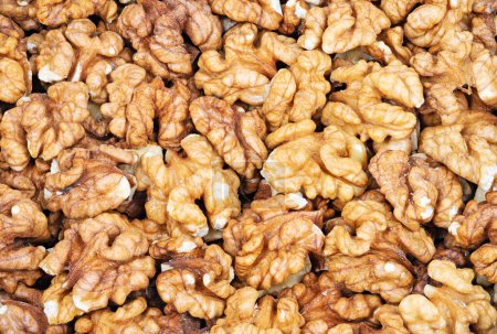 Photo for Full frame shot of walnuts background. Texture of peeled walnuts. - Royalty Free Image