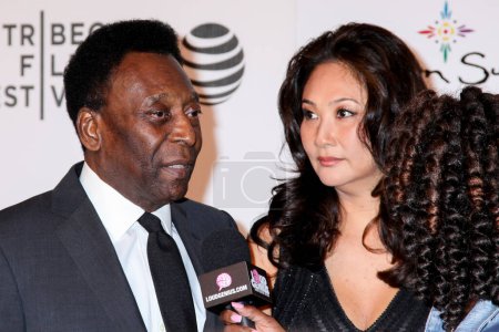 Photo for NEW YORK, NY, USA. 23 APRIL, 2016. Former Brazilian footballer Pele and Marcia Aoki  attends the 'Pele: Birth Of A Legend' World Premiere during the 2016 Tribeca Film Festival at BMCC John Zuccotti Theater - Royalty Free Image