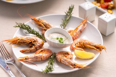 Seafood menu concept. Boiled shrimp shelled ready to eat. Seafood meal food snack on the table. Copy space