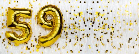 Golden foil balloon number, figure fifty-nine on white with confetti background. 59th birthday card. Anniversary concept. birthday, new year celebration. banner, copy space.