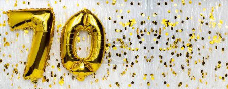 Ballon doré numéro 70 sur fond blanc avec confettis. Carte du 70e anniversaire. Concept anniversaire. anniversaire, célébration du nouvel an. bannière