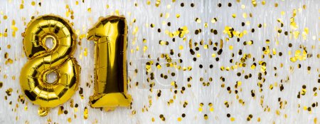 Golden foil balloon number, figure eighty-one on white with confetti background. 81th birthday card. Anniversary concept. birthday, celebration. banner