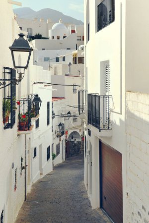 Photo for Vertical image cozy charming narrow street of Mojacar village. Almeria, south of Spain, no people. Travel destinations, holidays concept - Royalty Free Image