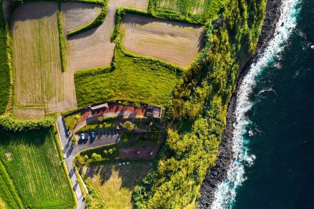 Photo for Aerial shot, drone point of view picturesque nature with green mountains, cliffs and Atlantic Ocean of Ponta Delgada Island. Azores, Portugal. Bird eye view. Travel destinations and tourism concept - Royalty Free Image