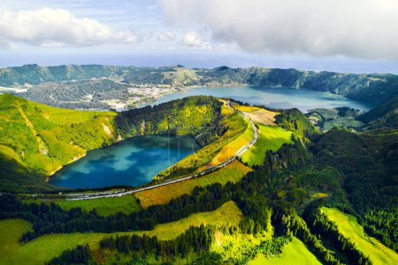 Aerial shot, drone point of view, Boca do Inferno. Picturesque lakes in volcanoes craters. San Miguel, Ponta Delgada island, Azores, Portugal. Bird eye view. Landmarks and natural wonders concept 
