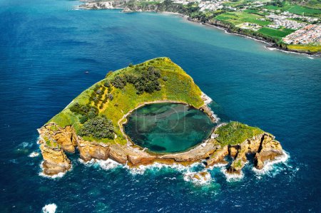Photo for Aerial shot, drone point of view of picturesque Islet of Vila Franca do Campo. Sao Miguel island, Azores, Portugal. Heart carved by nature. Bird eye view. Travel attraction and natural wonders concept - Royalty Free Image