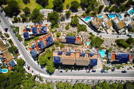 Photo for Drone point of view of luxury villas with swimming pools during sunny summer day. Real-estate, new build property and development concept. Spain, Costa Blanca, Las Ramblas. Alicante Province - Royalty Free Image