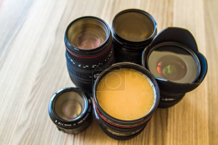 Photo for Arranged lens coffee mugs, coffee drinking and photography. - Royalty Free Image