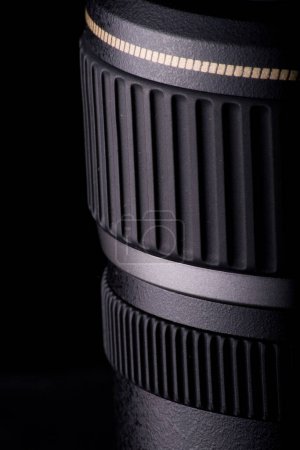 Photo for Detailed close-up of a modern camera lens against black background. - Royalty Free Image