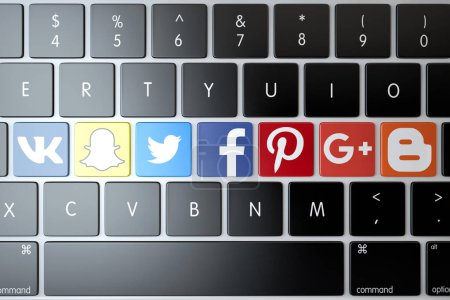 Foto de Various social networks and services icons on laptop keyboard. Technology concept. 3D Rendering - Imagen libre de derechos
