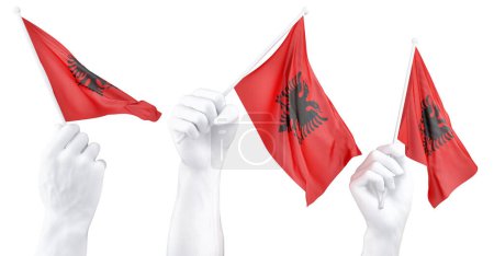 Three isolated hands waving Albania flags, symbolizing national pride and unity