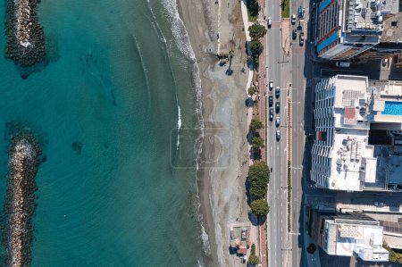 Overhead drone shot capturing the vibrant waterfront and urban layout of limassol, Cyprus