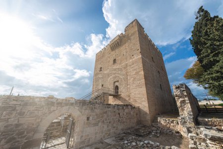 Wide-angle view of the historic Kolossi castle in Cyprus under a cloudy sky. Limassol District