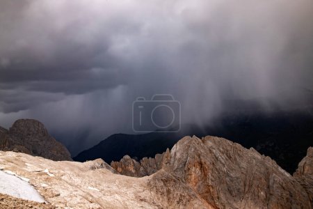 Photo for Panoramic view of Sassolungo and Sella group in summer storm in Italian Dolomite from the Marmolada in South Tyrol, Italy. - Royalty Free Image