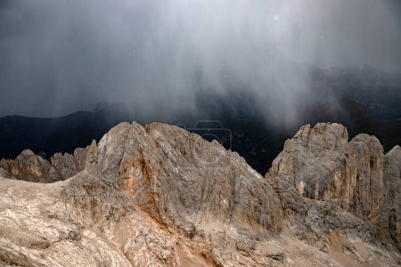 Photo for Panoramic view of Sassolungo and Sella group in summer storm in Italian Dolomite from the Marmolada in South Tyrol, Italy. - Royalty Free Image