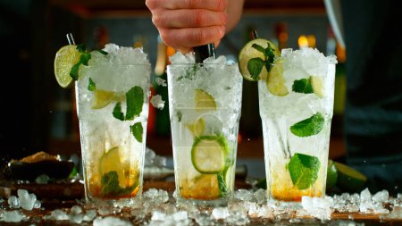 Photo for Close-up of preparing mojito cocktail on a bar - Royalty Free Image