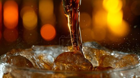 Photo for Freeze motion of pouring cola, macro shot - Royalty Free Image