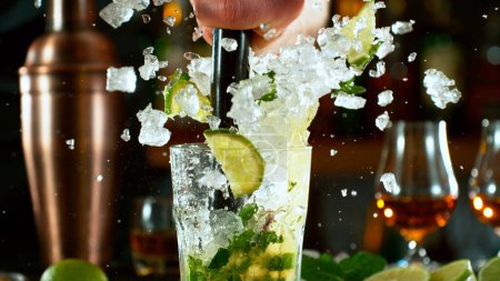 Photo for Mojito cocktail on the bar, dark toned background - Royalty Free Image