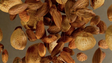 Foto de Freeze Motion Shot of Flying Whole Almonds, Close-up - Imagen libre de derechos