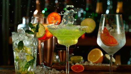 Photo for Fresh various cocktails on the bar, dark toned background - Royalty Free Image