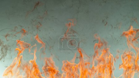 Foto de Llamas de fuego aisladas sobre fondo degradado gris oscuro - Imagen libre de derechos