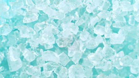 Photo for Super slow motion of rotating ice cubes, top view shot - Royalty Free Image